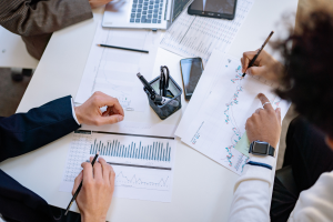 Australian borrowers reviewing financial charts and interest rate data for fixed vs variable loan decisions in 2026